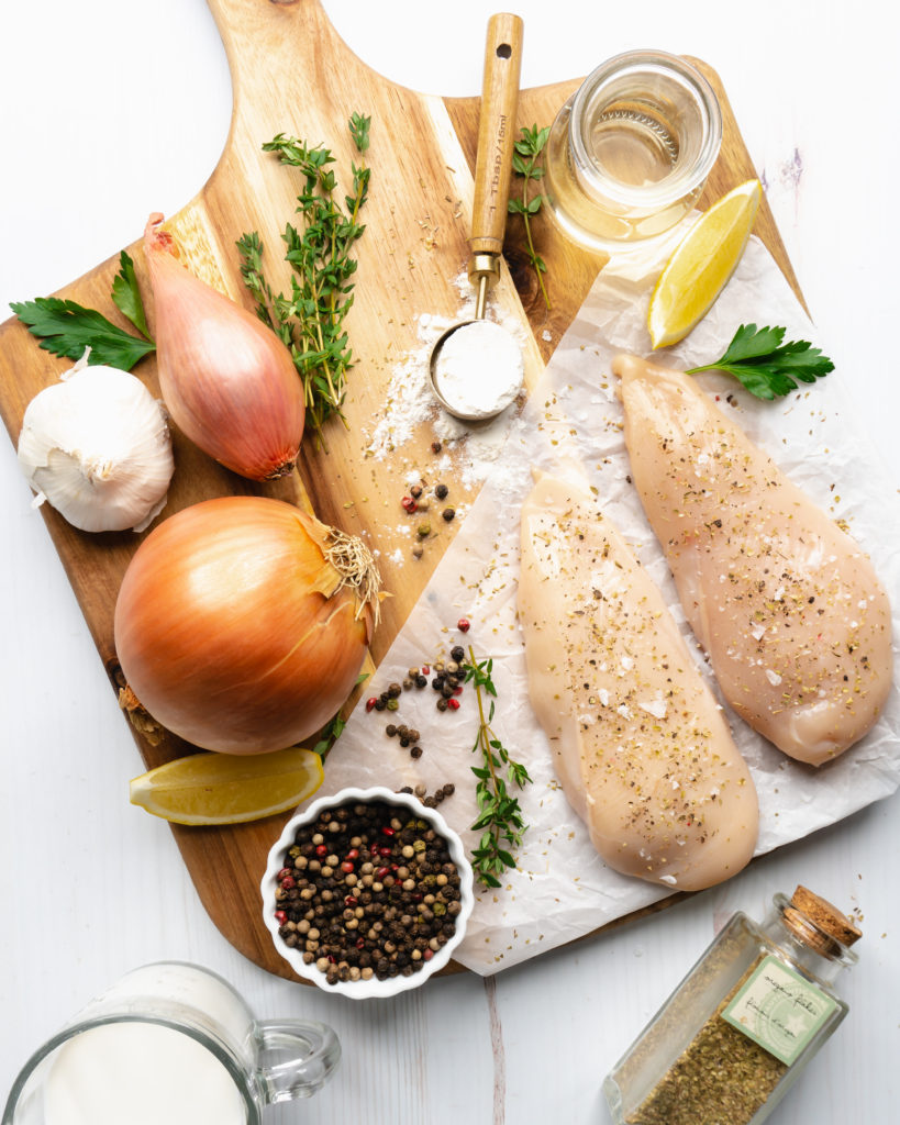 Components of chicken breasts with white wine sauce, including onions, shallots, white wine, half & half, and thyme.