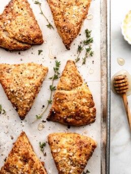 Savory bacon gruyere breakfast scones are flaky, savory, and delicious. Serve with butter or a bit of honey.