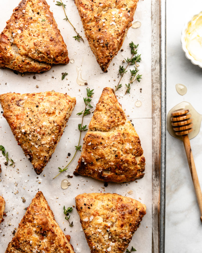 Savory bacon gruyere breakfast scones are flaky, savory, and delicious. Serve with butter or a bit of honey.