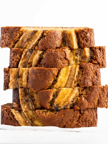 Moist and delicious golden banana bread is made with browned butter and bourbon, and baked to perfection.