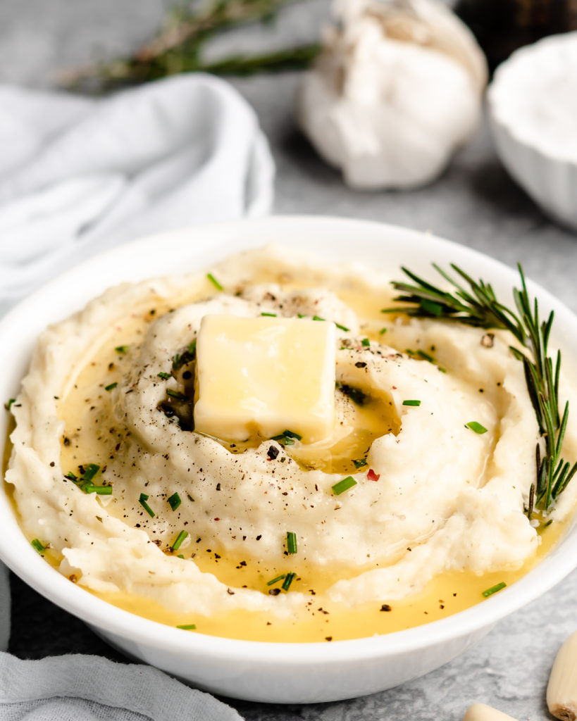 Super creamy buttery garlic mashed potatoes, topped with chives
