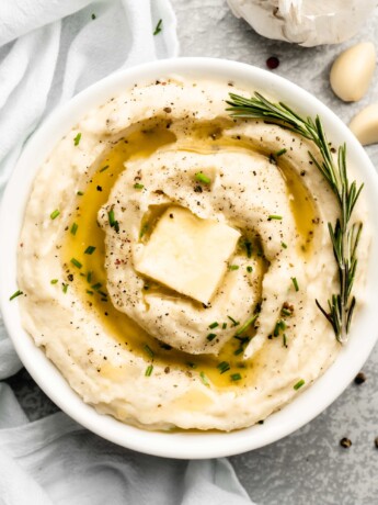 Super creamy buttery garlic mashed potatoes, topped with chives