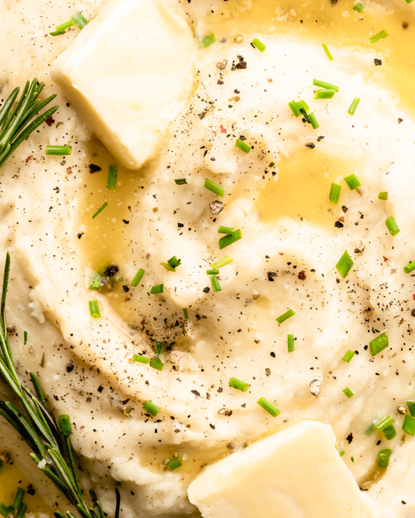 Super creamy buttery garlic mashed potatoes, topped with chives