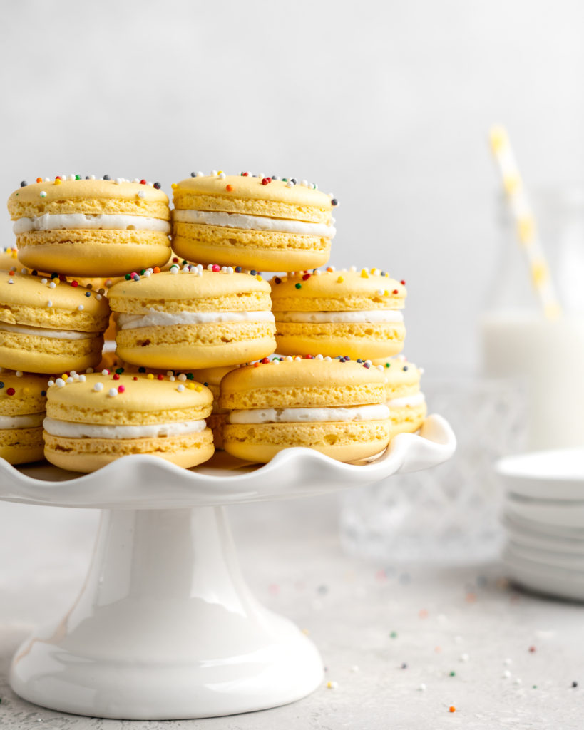 Yellow Macarons with rainbow sprinkles: How to make macarons; a guide to perfect macarons every time