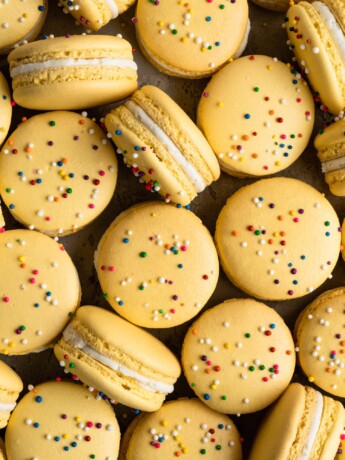 Yellow Macarons with rainbow sprinkles: How to make macarons; a guide to perfect macarons every time