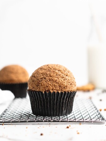 Spongy sweet chocolate chip cupcakes are topped with a creamy brown sugar frosting,and then rolled in crumbled chocolate chip cookies