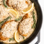 A delicious pan sauce is made after searing chicken breasts, with white wine, onions, shallots, rosemary, cream, mustard, and maple syrup.