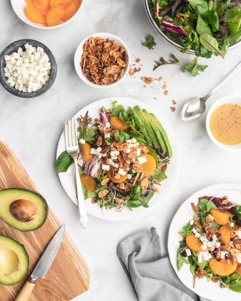 This delicious salad features spinach, spring mix, goat cheese, avocado, mandarins,and honey roasted almonds. Topped with a zippy champagne vinaigrette.