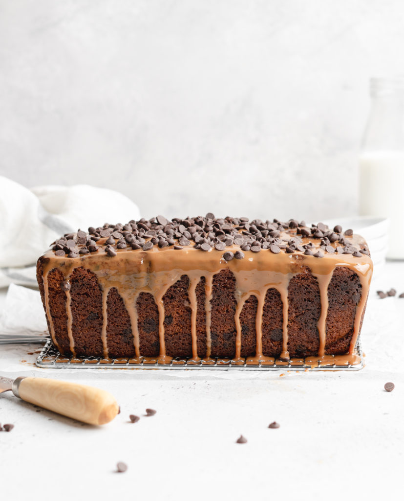 A deliciously moist chocolate chip loaf cake is swirled with dulce de leche