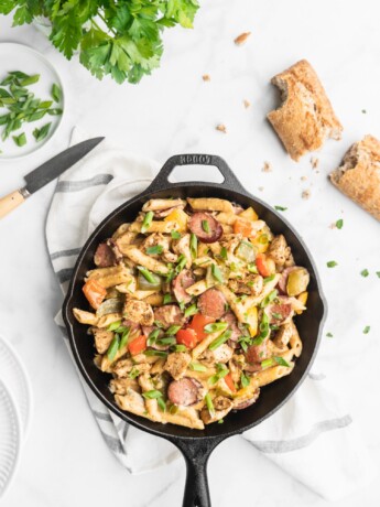 Penne, cream, peppers, onions, cajun chicken, and garlic sausage make up this easy and delicious one pot recipe.