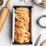 This braided Pizza bread features marinara, mozzarella, and parmesan as a filliing, which is then sliced and braided into the bread to create a artistic looking bread
