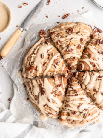 These carrot cake cones are sweet, heart warming, and delicious! With pecans and maple cream cheese glaze