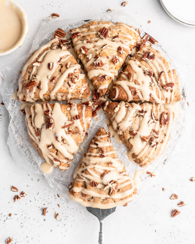 These carrot cake cones are sweet, heart warming, and delicious! With pecans and maple cream cheese glaze
