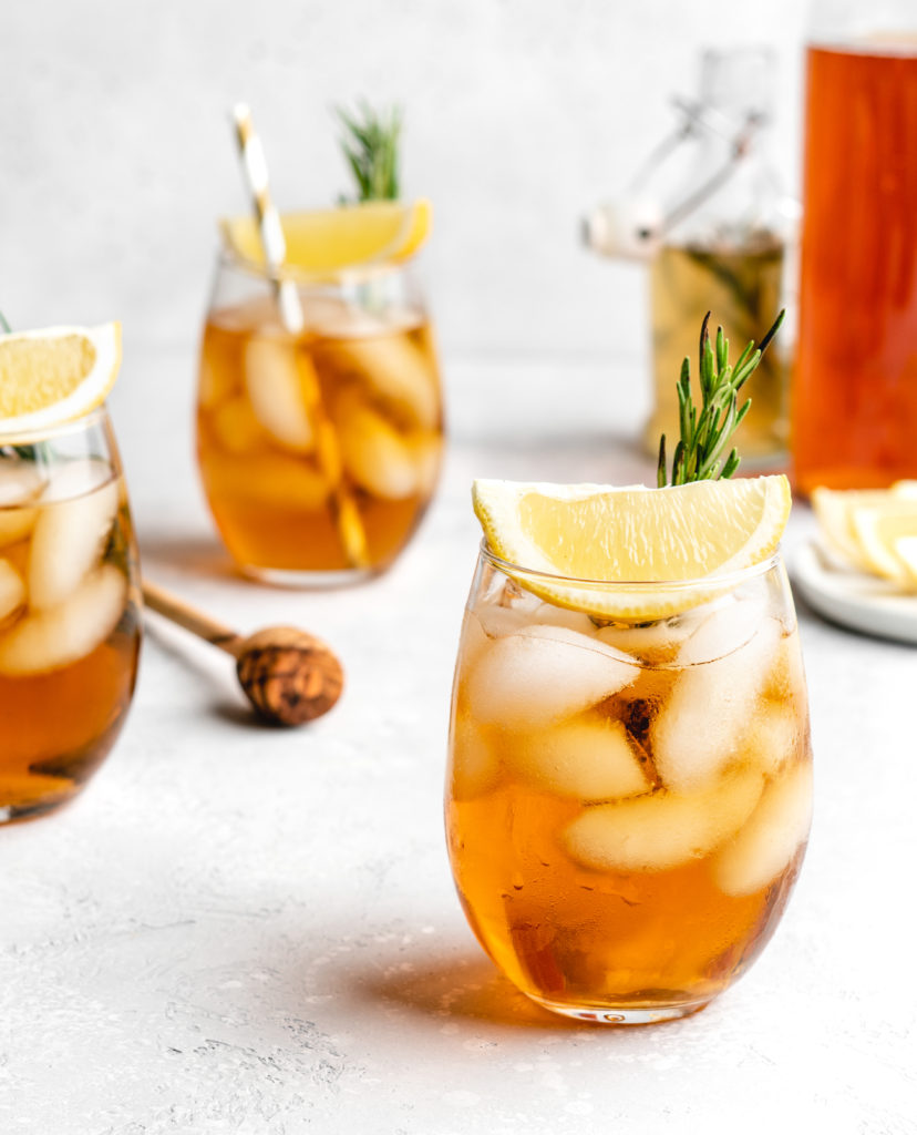 This non-alcoholic iced tea is sweetened with a rosemary honey simple syrup