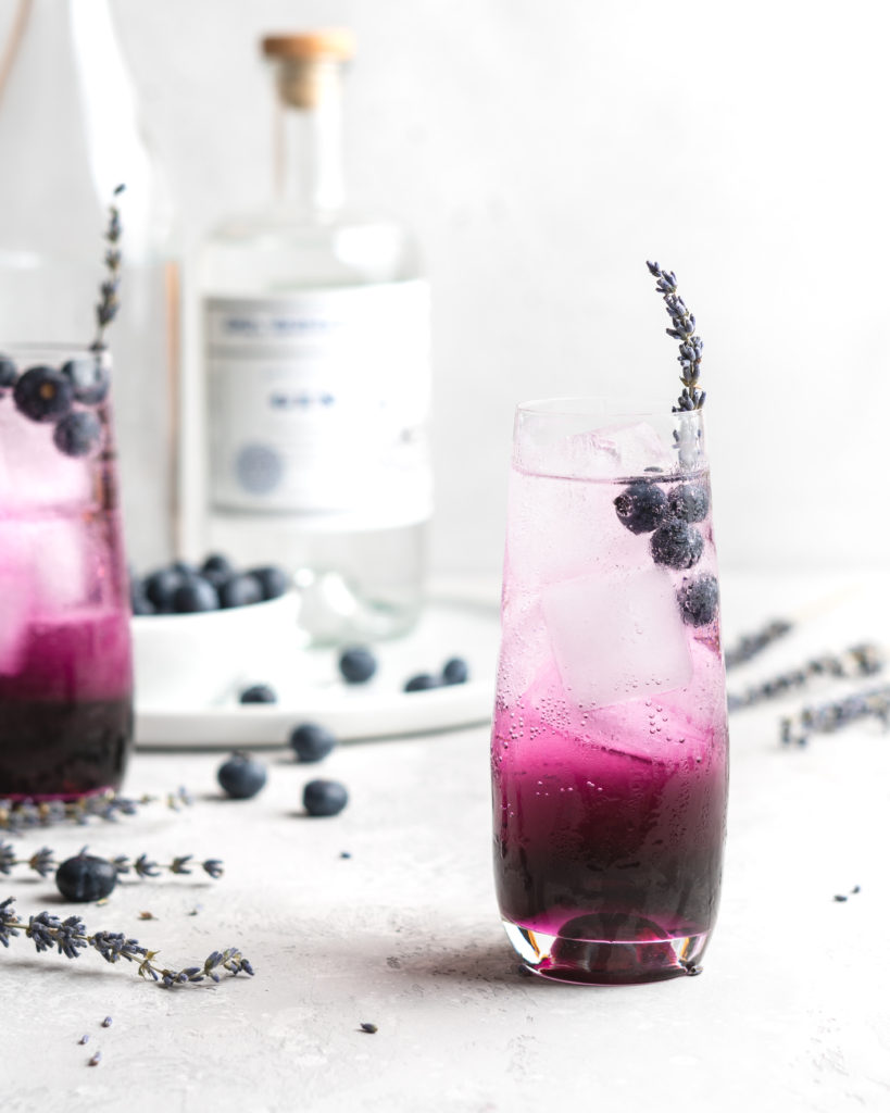 Blueberry juice, lavender syrup, gin, club soda, and a little bit of lemon make up the contents for this cocktail