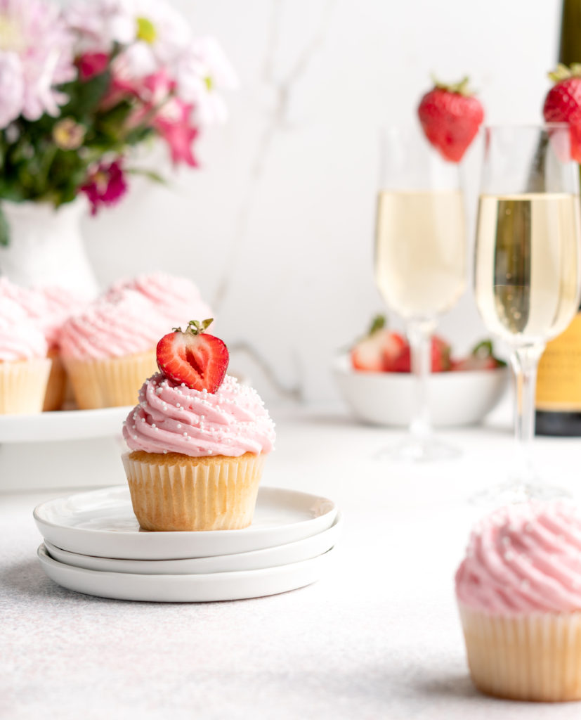 Bubbling with fun flavors, these Prosecco Cupcakes are topped with a fruity strawberry buttercream