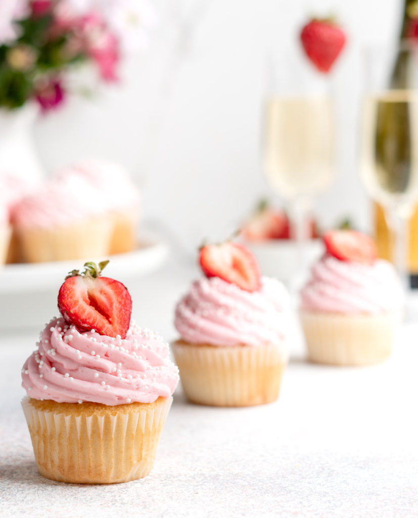 Bubbling with fun flavors, these Prosecco Cupcakes are topped with a fruity strawberry buttercream