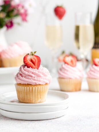 Bubbling with fun flavors, these Prosecco Cupcakes are topped with a fruity strawberry buttercream