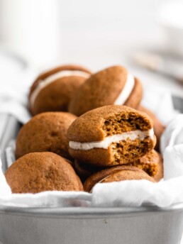 These Pumpkin Whoopie Pies feature Brown Butter Cream Cheese Filling is sandwiched between 2 fluffy pumpkin cookies