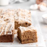 This Apple Cinnamon Spice Cake features a moist, perfectly-spiced cake that is speckled with apples and topped with a buttery streusel topping