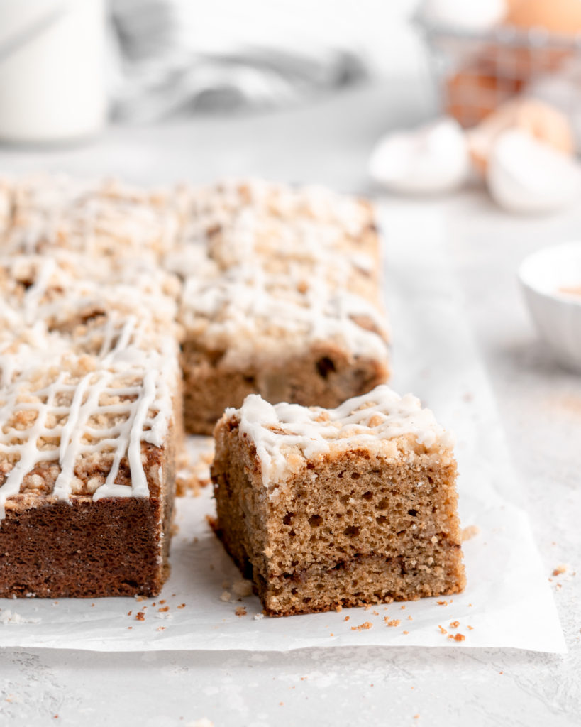 This Apple Cinnamon Spice Cake features a moist, perfectly-spiced cake that is speckled with apples and topped with a buttery streusel topping