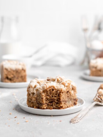 This Apple Cinnamon Spice Cake features a moist, perfectly-spiced cake that is speckled with apples and topped with a buttery streusel topping