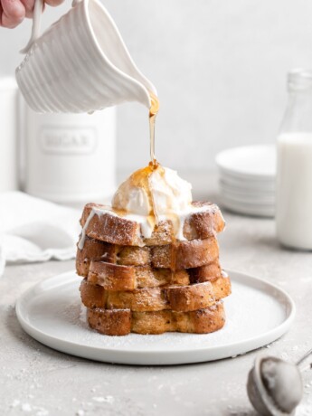 Thick slices of Grand Marnier infused buttermilk French Toast, topped with ice cream and syrup