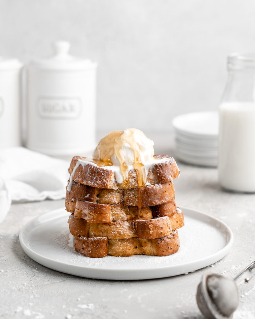 Thick slices of Grand Marnier infused buttermilk French Toast, topped with ice cream and syrup