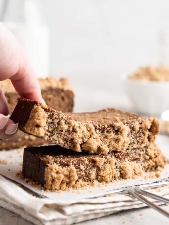 Moist tender banana bread is spiced with chai tea and chai flavors and topped with a buttery streusel topping