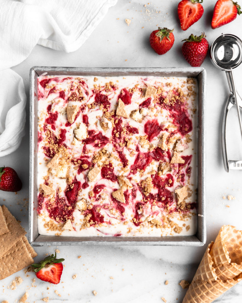 No Churn Strawberry Cheesecake Ice Cream in a square pan