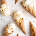 Homemade no churn salted honey and peach ice cream in cones