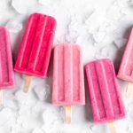 Bright pink popsicles are made with guava juice, dragon fruit (pitaya), greek yogurt, and agave.