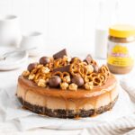 SunButter Cheesecake features a chocolate pretzel crust and is topped with a salted caramel sauce