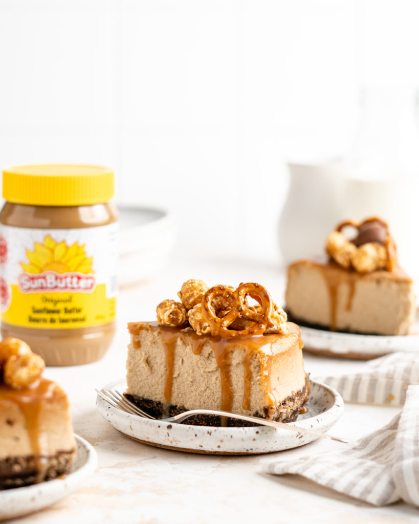 SunButter Cheesecake features a chocolate pretzel crust and is topped with a salted caramel sauce