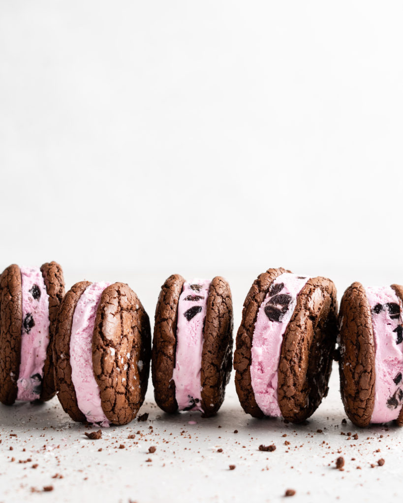Fudgy chocolate cookies are sandwiched over black berry ice cream to make these Black Forest Ice Cream Sandwiches