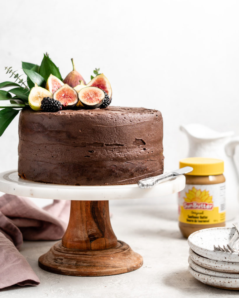2 Layer SunButter Banana Cake with a rich chocolate frosting. Topped with figs