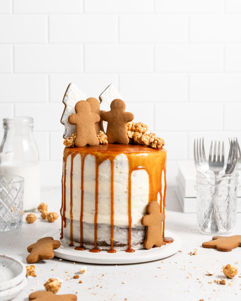 Naked style gingerbread layer cake with cream cheese frosting and salted caramel drip