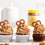 Chocolate Cupcake with Pretzel Crust and SunButter buttercream frosting. Topped with salted caramel