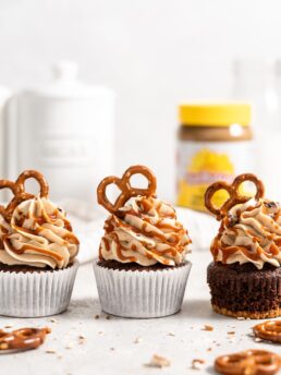 Chocolate Cupcake with Pretzel Crust and SunButter buttercream frosting. Topped with salted caramel