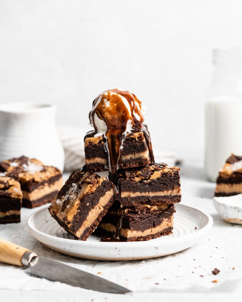 fudgy Peanut Butter stuffed brownies with peanut butter swirl on top 