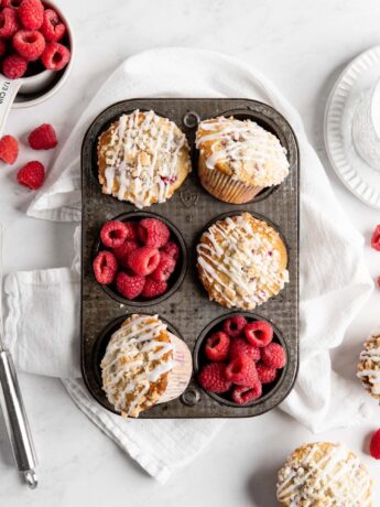 Fluffy and tall Buttermilk Raspberry Muffins with streusel topping