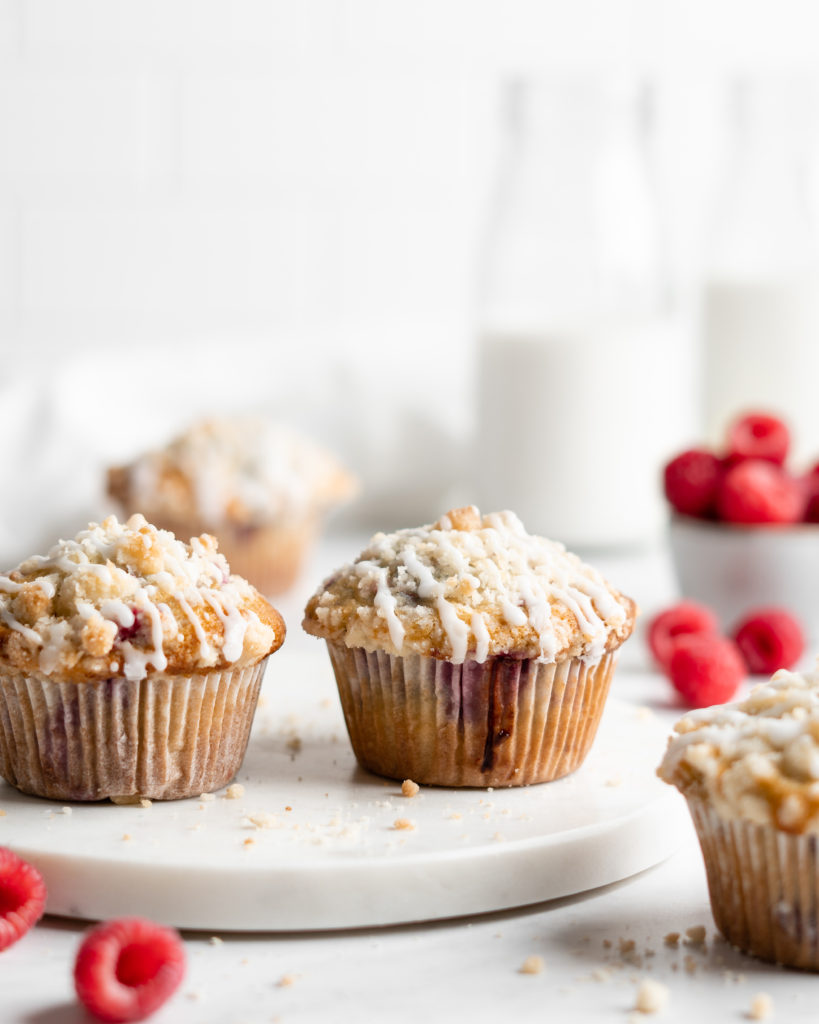 Fluffy and tall Buttermilk Raspberry Muffins with streusel topping