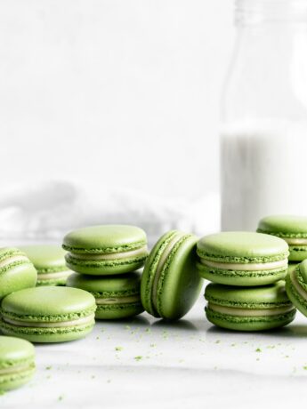 Bright green matcha macarons filled with matcha white chocolate ganache