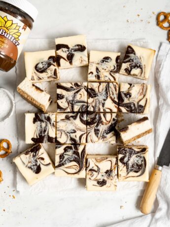 Chocolate SunButter Cheesecake swirl cheesecake bars feature a beautiful marbled top