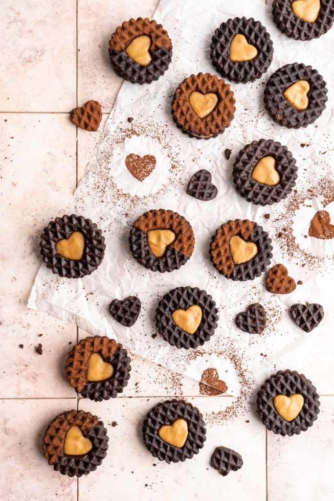 Chocolate sugar cookies sandwiched together with creamy peanut butter