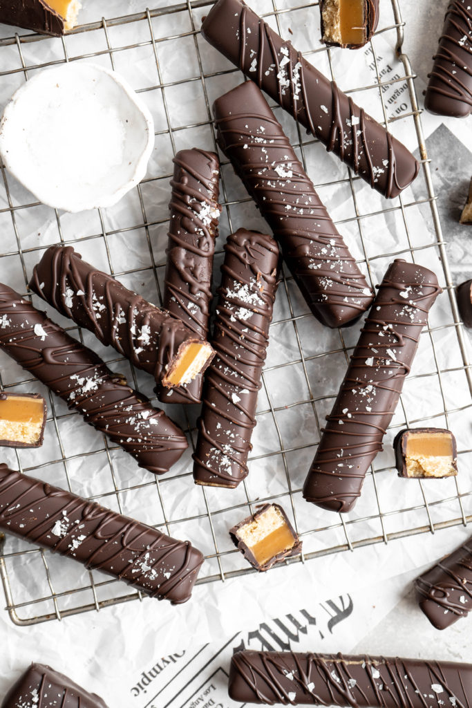 Homemade twin bars are made with a shortbread layer, a soft caramel layer, a creamy SunButter layer, and coated in dark chocolate