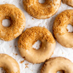 Coffee donuts with coffee glaze sprinkled with crushed biscoff cookies