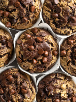 Tops of bakery style double chocolate chip muffins
